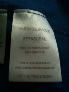 The image shows a clothing tag with the following text:

"YOUR UNIQUE BAACODE
2E7A3DB6E

MEET THE MERINO SHEEP THAT GREW THIS

TYPE IN YOUR BAACODE AT
WWW.ICEBREAKER.COM/BAACODE

LET THE TRACE BEGIN"