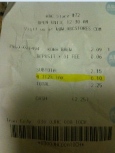 The image shows a receipt from ABC Store #72. The receipt includes the following details:

- The store is open until 12:30 AM.
- The website for the store is www.abcstores.com.
- The items purchased include Kona Brew for $2.09 and a deposit/01 fee for $0.06.
- The subtotal is $2.15.
- There is a 4.712% tax amounting to $0.10, which is highlighted.
- The total amount is $2.25.
- The payment was made in cash, with the amount tendered being $2.25.
- There is a transaction code at the bottom: 050 0J0C 00A 1C0H, along with a barcode.