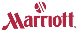 The image shows the logo of Marriott, a well-known hotel chain. The logo features the word "Marriott" in a distinctive red font, with a stylized "M" above the text.