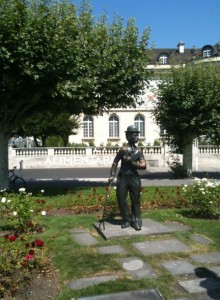 a statue of a man in a park