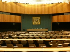 a room with many chairs and tables