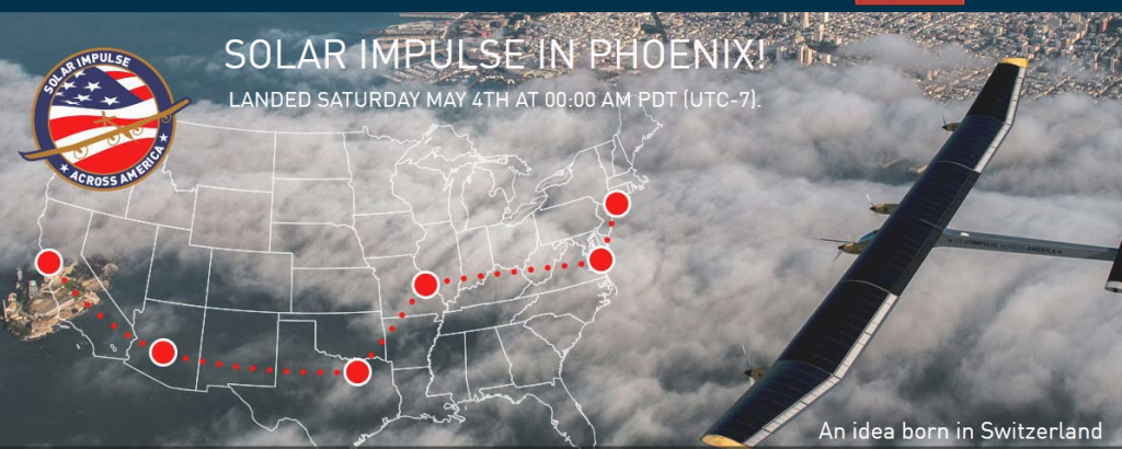 Alt text: An image showing a map of the United States with a flight path marked by red dots, indicating stops across the country. The text reads "Solar Impulse in Phoenix! Landed Saturday May 4th at 00:00 AM PDT (UTC-7)." There is a logo on the top left corner with the text "Solar Impulse Across America." On the right side of the image, there is a solar-powered airplane flying above the clouds. The bottom right corner has the text "An idea born in Switzerland."